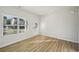 Sunlit office with vinyl flooring and multiple windows at 11834 Rizvan Pl, Covington, GA 30014