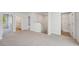 Spacious loft area with carpet and multiple closets at 11834 Rizvan Pl, Covington, GA 30014
