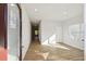 Bright entryway with vinyl plank flooring and access to other rooms at 11834 Rizvan Pl, Covington, GA 30014