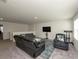 Upstairs living area with sectional sofa and recliner at 250 Cotton Tail Ln, Villa Rica, GA 30180