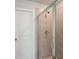 Bathroom with a tiled shower and glass enclosure at 11814 Rizvan Pl, Covington, GA 30014
