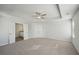 Main bedroom with private bathroom access and walk-in closet at 11814 Rizvan Pl, Covington, GA 30014