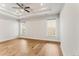 Spacious bedroom with hardwood floors and ceiling fan at 370 Thrasher St # 2, Norcross, GA 30071