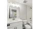 Small bathroom with white vanity and a shower at 370 Thrasher St # 2, Norcross, GA 30071