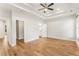 Large main bedroom with hardwood floors and an en suite bathroom at 370 Thrasher St # 2, Norcross, GA 30071