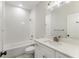 Clean bathroom with white vanity and shower/tub combo at 370 Thrasher St # 2, Norcross, GA 30071