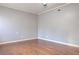Simple bedroom with hardwood floors and neutral walls at 4650 Heather Ct, Union City, GA 30291