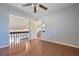 Bedroom with hardwood floors and access to upper loft at 4650 Heather Ct, Union City, GA 30291