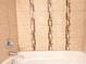 Clean bathroom with tub and accent tile at 4650 Heather Ct, Union City, GA 30291