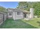 Home exterior showcasing a spacious backyard at 4650 Heather Ct, Union City, GA 30291