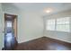 Bedroom with hardwood floors, and access to hallway at 182 Arcadia Nw Cir, Atlanta, GA 30314