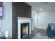 Living room fireplace with a reclaimed wood accent wall at 2702 Wedgewood Ter, Decatur, GA 30032