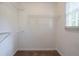 Large walk-in closet with wire shelving at 1507 Hillside Se Dr, Conyers, GA 30094