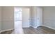 Bright bedroom with hardwood floors and ample closet space at 1507 Hillside Se Dr, Conyers, GA 30094