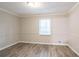 Simple dining room with hardwood floors and neutral wall colors at 1507 Hillside Se Dr, Conyers, GA 30094