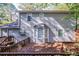 Spacious deck overlooks backyard with wooded area at 1507 Hillside Se Dr, Conyers, GA 30094