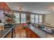 Eat-in kitchen with dark wood cabinets and dark countertops at 733 Frederica Ne St # 2, Atlanta, GA 30306