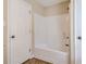 Simple bathroom with shower/tub combo and tile floor at 9170 Jefferson Sw Ave, Covington, GA 30014