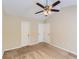 Large bedroom with double closets and ceiling fan at 9170 Jefferson Sw Ave, Covington, GA 30014