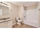 Bathroom with toilet, tub shower combo, and vanity at 9170 Jefferson Sw Ave, Covington, GA 30014