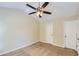 Spacious bedroom with neutral walls, ceiling fan, and carpet at 9170 Jefferson Sw Ave, Covington, GA 30014