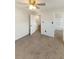 Simple bedroom with neutral walls and carpeting at 4060 Willowmere Pointe Nw, Kennesaw, GA 30144