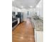 Kitchen with granite countertops, stainless steel appliances, and hardwood floors at 4060 Willowmere Pointe Nw, Kennesaw, GA 30144