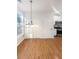 Kitchen and dining area with hardwood floors and a chandelier at 4060 Willowmere Pointe Nw, Kennesaw, GA 30144