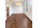 Dining room features hardwood floors and a chandelier at 4060 Willowmere Pointe Nw, Kennesaw, GA 30144