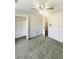 Well-lit bedroom featuring a double door closet at 4060 Willowmere Pointe Nw, Kennesaw, GA 30144