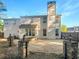 Brick paved patio and stone pillars create a charming backyard space at 4060 Willowmere Pointe Nw, Kennesaw, GA 30144