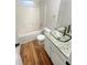 Bathroom with granite countertop, glass sink, and updated fixtures at 4060 Willowmere Pointe Nw, Kennesaw, GA 30144