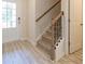 Inviting entryway with stairs and wood-look flooring at 722 Gabby Pts, Mableton, GA 30126