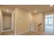 Upstairs hallway with carpet and access to bedrooms at 722 Gabby Pts, Mableton, GA 30126