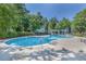 Community swimming pool with lounge chairs and umbrellas at 970 Sidney Marcus Ne Blvd # 2112, Atlanta, GA 30324