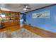 Bright living room with hardwood floors, built-in shelving, and a cozy rug at 903 Bingham Ln, Stone Mountain, GA 30083