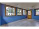 Sunroom with tiled floors and ceiling fan at 903 Bingham Ln, Stone Mountain, GA 30083