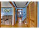 Bright hallway with hardwood floors and access to bedrooms at 903 Bingham Ln, Stone Mountain, GA 30083