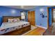 Bedroom with a wooden bed frame and a closet at 903 Bingham Ln, Stone Mountain, GA 30083