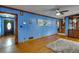 Hardwood floors, blue walls, and view of entryway at 903 Bingham Ln, Stone Mountain, GA 30083