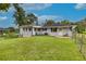 House exterior with large backyard and garden at 903 Bingham Ln, Stone Mountain, GA 30083