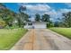 Ranch home with attached garage and spacious front yard at 903 Bingham Ln, Stone Mountain, GA 30083
