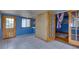 Sunroom with tiled floors, multiple windows, and access to outdoors at 903 Bingham Ln, Stone Mountain, GA 30083