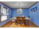 Bright dining room with hardwood floors and a wood dining table at 903 Bingham Ln, Stone Mountain, GA 30083