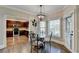 Breakfast nook with glass-top table and chairs near kitchen at 1984 Buford Dam Rd, Buford, GA 30518