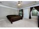 Large main bedroom with ceiling fan and private access at 1220 Heartwood Ave, Mcdonough, GA 30253