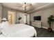Spacious bedroom with large TV and ensuite bathroom access at 3107 Peachtree Road Ne Unit #1803, Atlanta, GA 30305