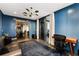 Home office with blue walls, hardwood floors and city view at 3107 Peachtree Road Ne Unit #1803, Atlanta, GA 30305