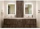 Modern bathroom with double vanity and sleek wood cabinets at 3107 Peachtree Road Ne Unit #1803, Atlanta, GA 30305