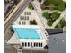 Geometric rooftop pool with lounge chairs and landscaping at 3107 Peachtree Road Ne Unit #1803, Atlanta, GA 30305